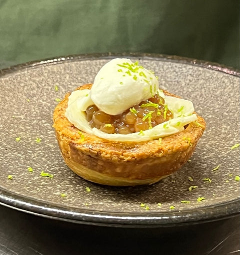 Dulce de Leche and Banana Tartlets with Tiger Purrr Pearls, Cream and Lime Zest
