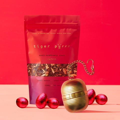 Tiger Purrr chai easter bundle with 150g Tiger  Purrr chau, one golden egg strainer and 5 dark chocolate Easter eggs